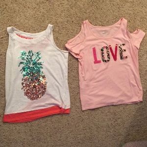 2 girls Justice shirts